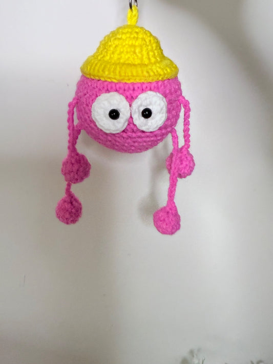 Pomponín, el viajero curioso – Llavero amigurumi”